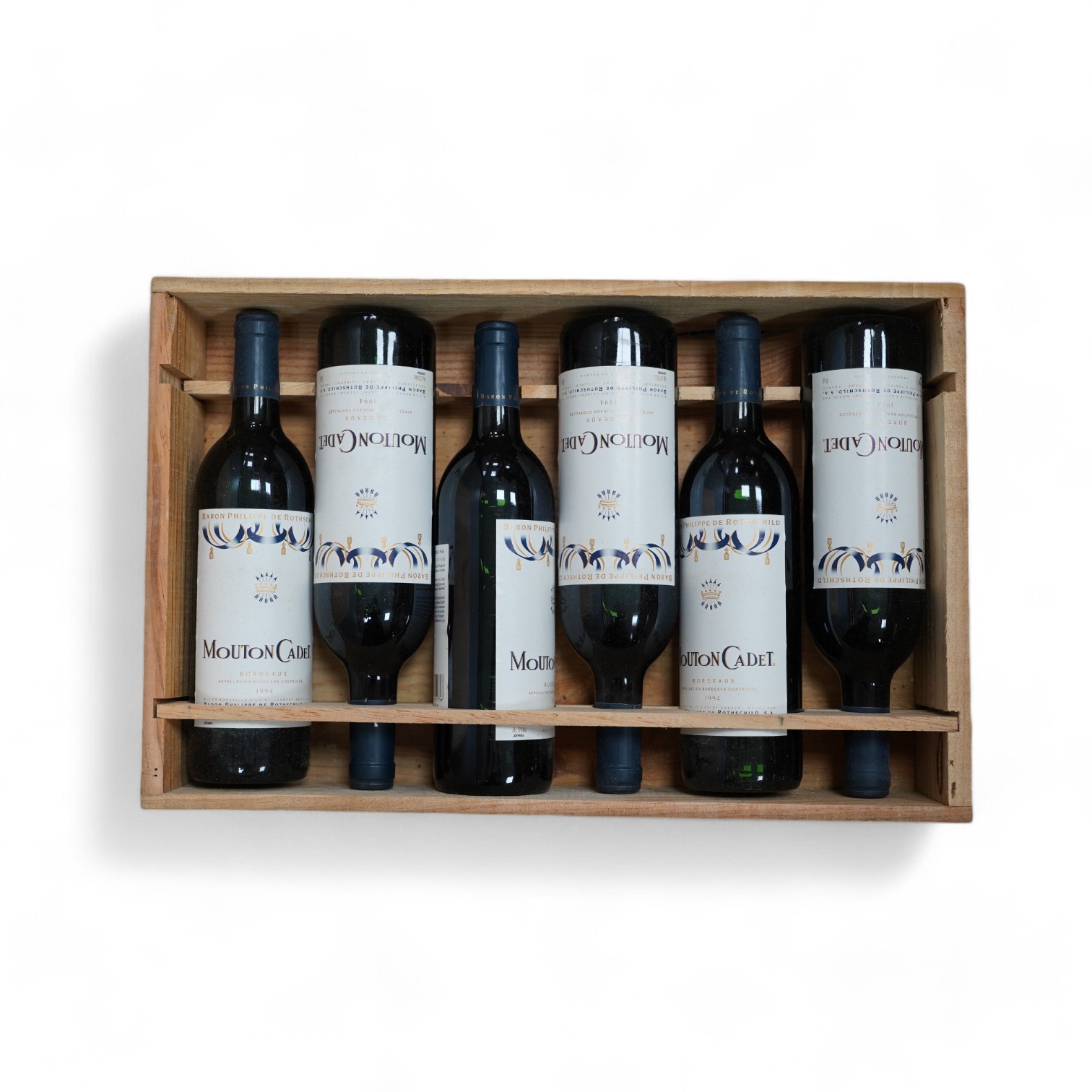 A case of six bottles of Mouton Cadet Bordeaux 1994. Condition - good, storage history unknown